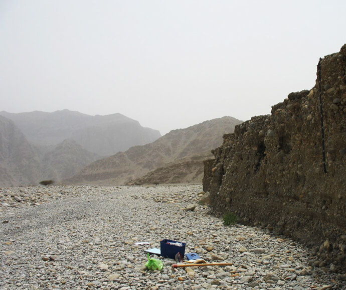 Rocky soil with mountains in the background