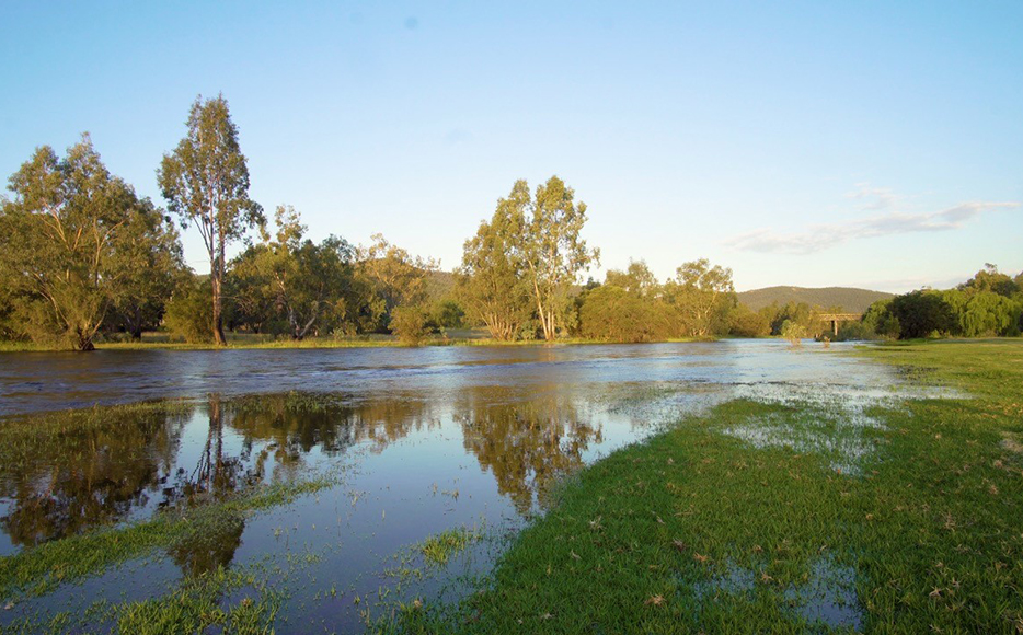 Gwydir River flowing at Bingara, with bridge in the background.