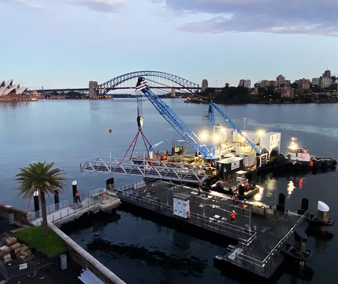 The new pontoon at Fort Denison was successfully floated into position and the new aluminium gangway was craned into position on 29 April 2022