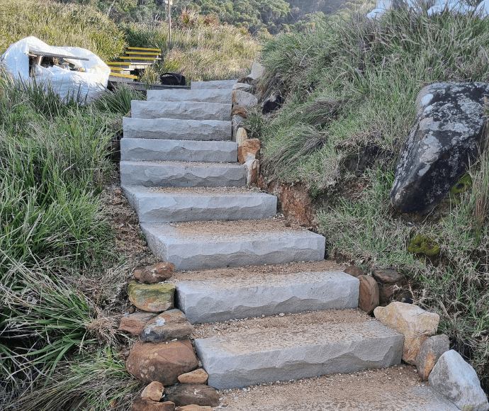 Red dusty ascending outdoor staircase