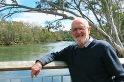 David Thurley standing in front of a river